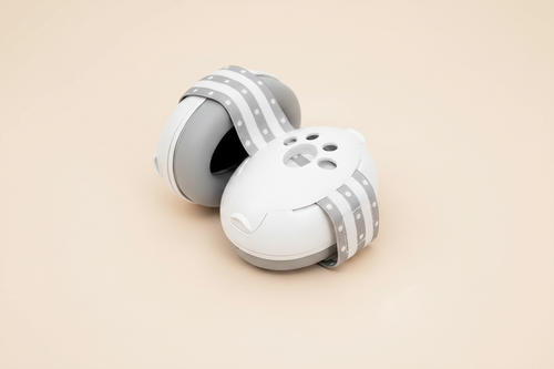 Little Nestlings White Baby Ear Muffs on Cream Background